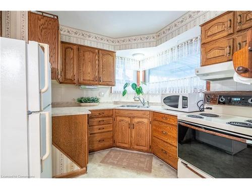 1053 Fennell Avenue E, Hamilton, ON - Indoor Photo Showing Kitchen With Double Sink