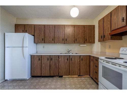 1203-301 Frances Avenue, Stoney Creek, ON - Indoor Photo Showing Kitchen With Double Sink