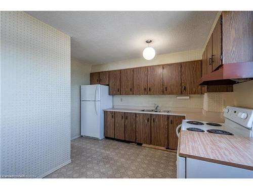 1203-301 Frances Avenue, Stoney Creek, ON - Indoor Photo Showing Kitchen With Double Sink