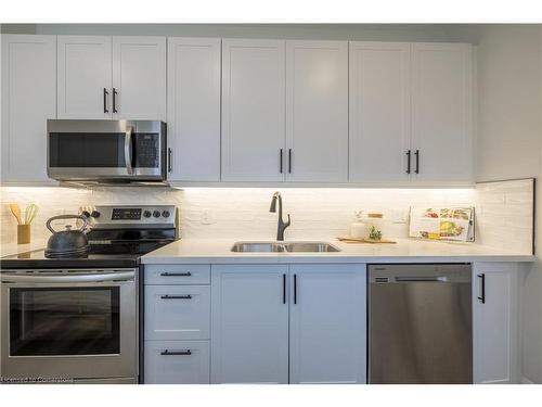 5 Florence Street, Hamilton, ON - Indoor Photo Showing Kitchen With Stainless Steel Kitchen With Double Sink With Upgraded Kitchen