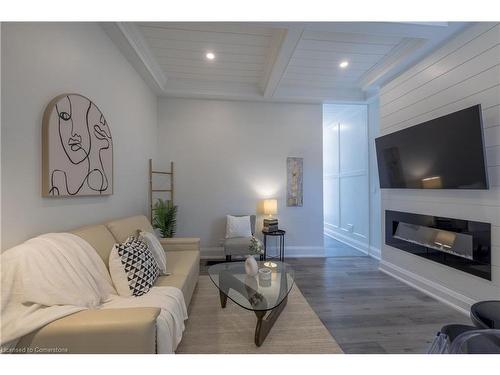 5 Florence Street, Hamilton, ON - Indoor Photo Showing Living Room With Fireplace