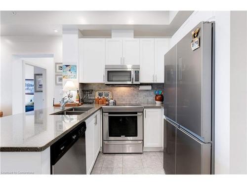 404-35 Southshore Crescent, Stoney Creek, ON - Indoor Photo Showing Kitchen With Stainless Steel Kitchen With Double Sink With Upgraded Kitchen