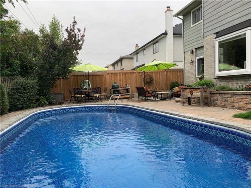 504 Mathewman Crescent, Burlington, ON - Outdoor With In Ground Pool With Backyard