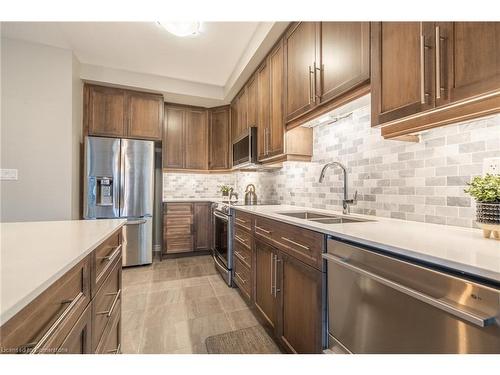 4012 Crown Street, Beamsville, ON - Indoor Photo Showing Kitchen With Double Sink With Upgraded Kitchen