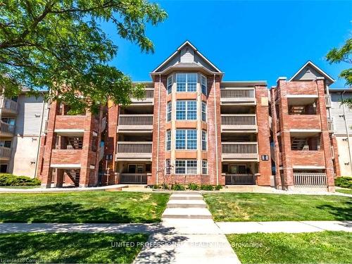 408-4013 Kilmer Drive, Burlington, ON - Outdoor With Balcony With Facade