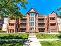 408-4013 Kilmer Drive, Burlington, ON  - Outdoor With Balcony With Facade 