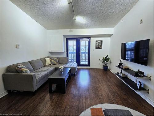 408-4013 Kilmer Drive, Burlington, ON - Indoor Photo Showing Living Room