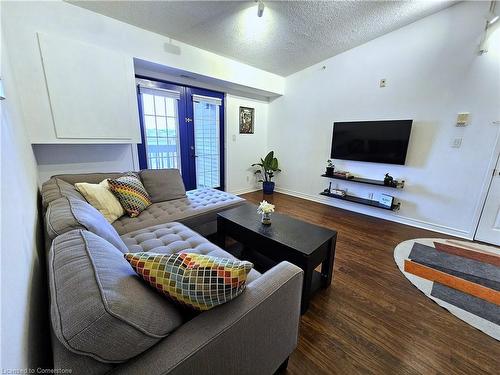 408-4013 Kilmer Drive, Burlington, ON - Indoor Photo Showing Living Room