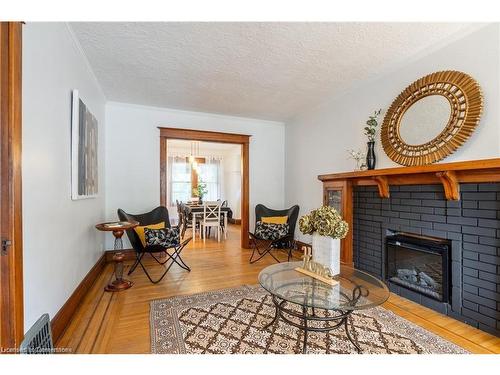 56 Newton Avenue, Hamilton, ON - Indoor Photo Showing Living Room With Fireplace