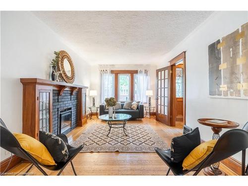 56 Newton Avenue, Hamilton, ON - Indoor Photo Showing Living Room With Fireplace