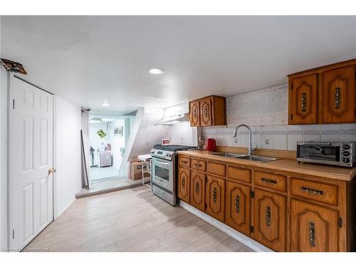 50 1/2 Clyde Street, Hamilton, ON - Indoor Photo Showing Kitchen With Double Sink