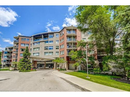 501-77 Governors Road, Dundas, ON - Outdoor With Balcony With Facade