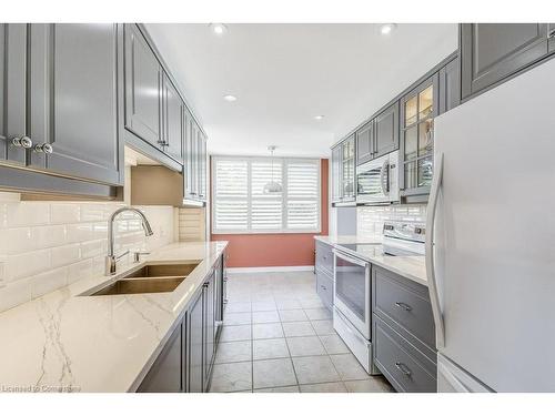 501-77 Governors Road, Dundas, ON - Indoor Photo Showing Kitchen With Double Sink