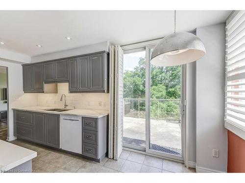 501-77 Governors Road, Dundas, ON - Indoor Photo Showing Kitchen With Double Sink