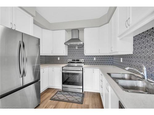 26-305 Garner Road W, Hamilton, ON - Indoor Photo Showing Kitchen With Double Sink