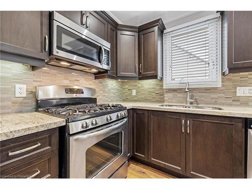 221 West 19Th Street, Hamilton, ON - Indoor Photo Showing Kitchen With Stainless Steel Kitchen With Double Sink