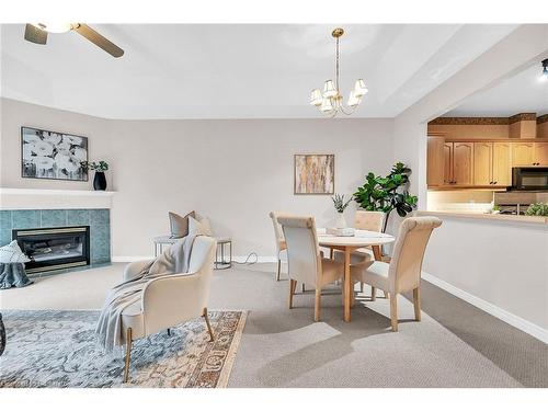 54 Greentrail Drive, Mount Hope, ON - Indoor Photo Showing Dining Room With Fireplace