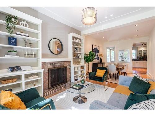 24 Bruce Street, Hamilton, ON - Indoor Photo Showing Living Room With Fireplace