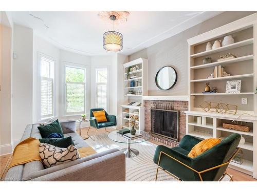 24 Bruce Street, Hamilton, ON - Indoor Photo Showing Living Room With Fireplace