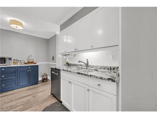 406-700 Dynes Road, Burlington, ON - Indoor Photo Showing Kitchen With Double Sink