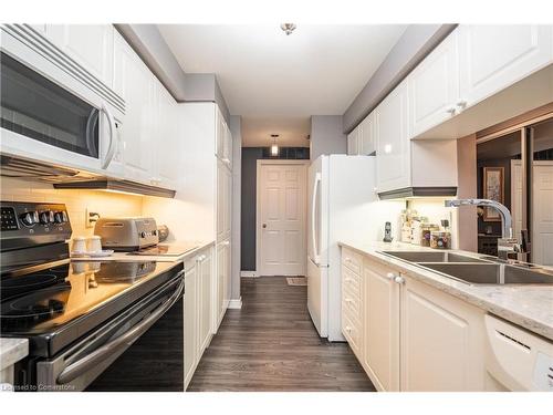 107-980 Golf Links Road, Ancaster, ON - Indoor Photo Showing Kitchen With Double Sink