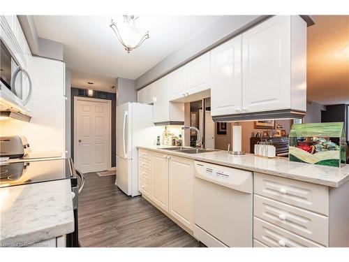 107-980 Golf Links Road, Ancaster, ON - Indoor Photo Showing Kitchen With Double Sink