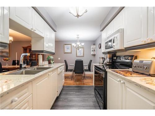 107-980 Golf Links Road, Ancaster, ON - Indoor Photo Showing Kitchen With Double Sink