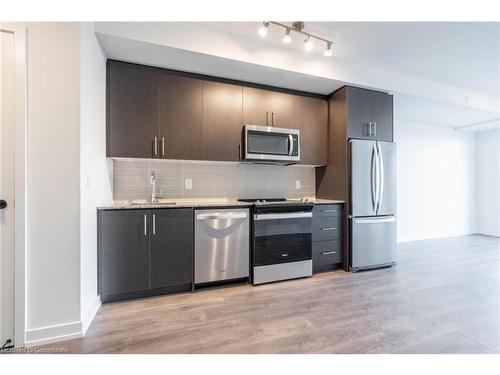 513-345 Wheat Boom Drive, Oakville, ON - Indoor Photo Showing Kitchen With Upgraded Kitchen