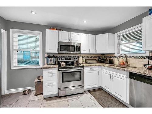 766 Upper Gage Avenue, Hamilton, ON - Indoor Photo Showing Kitchen With Double Sink