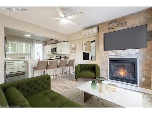 2-138 Bold Street, Hamilton, ON - Indoor Photo Showing Living Room With Fireplace