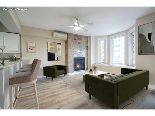 2-138 Bold Street, Hamilton, ON - Indoor Photo Showing Living Room With Fireplace