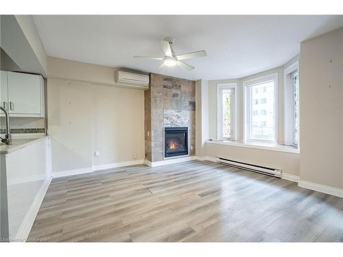 2-138 Bold Street, Hamilton, ON - Indoor Photo Showing Living Room With Fireplace