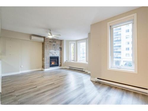 2-138 Bold Street, Hamilton, ON - Indoor Photo Showing Living Room With Fireplace