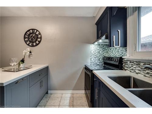 75 Colcrest Street, Hamilton, ON - Indoor Photo Showing Kitchen With Double Sink