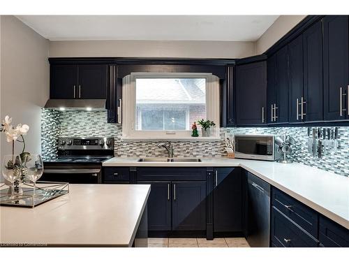 75 Colcrest Street, Hamilton, ON - Indoor Photo Showing Kitchen With Double Sink