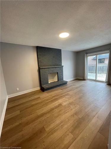 31 Vega Crescent, Hamilton, ON - Indoor Photo Showing Other Room With Fireplace