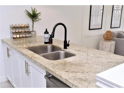 27-310 Fall Fair Way, Binbrook, ON - Indoor Photo Showing Kitchen With Double Sink