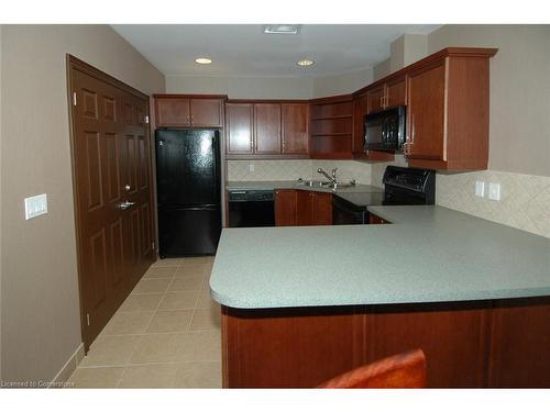 805-1477 Lakeshore Road, Burlington, ON - Indoor Photo Showing Kitchen With Double Sink