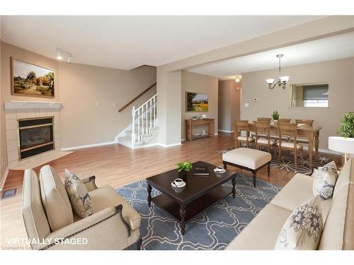 44-55 Kerman Avenue, Grimsby, ON - Indoor Photo Showing Living Room With Fireplace