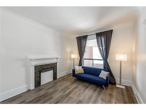 1-191 Sherman Avenue S, Hamilton, ON - Indoor Photo Showing Living Room With Fireplace