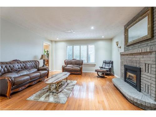 7 Grandoaks Drive, Hamilton, ON - Indoor Photo Showing Living Room With Fireplace