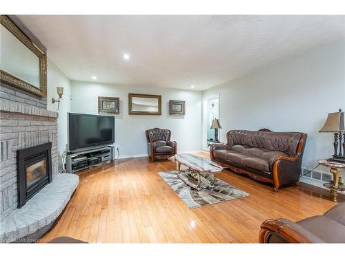 7 Grandoaks Drive, Hamilton, ON - Indoor Photo Showing Living Room With Fireplace