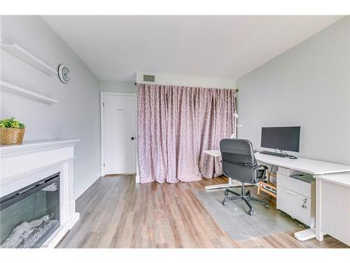 709-5090 Pinedale Avenue, Burlington, ON - Indoor Photo Showing Office With Fireplace