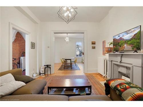 136 East Avenue N, Hamilton, ON - Indoor Photo Showing Living Room With Fireplace