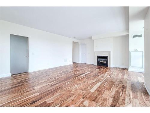 323-11 Bronte Road, Oakville, ON - Indoor Photo Showing Living Room With Fireplace