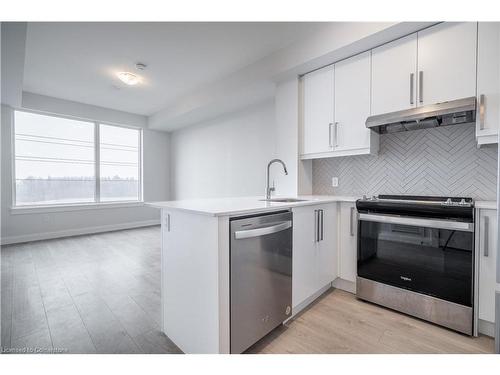 408-3220 William Coltson Avenue, Oakville, ON - Indoor Photo Showing Kitchen With Upgraded Kitchen