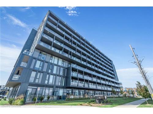 B918-3200 Dakota Common, Burlington, ON - Outdoor With Balcony With Facade