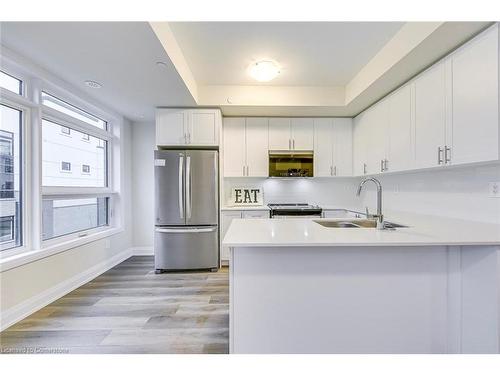 105-1577 Rose Way, Milton, ON - Indoor Photo Showing Kitchen With Stainless Steel Kitchen