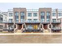 105-1577 Rose Way, Milton, ON  - Outdoor With Balcony With Facade 