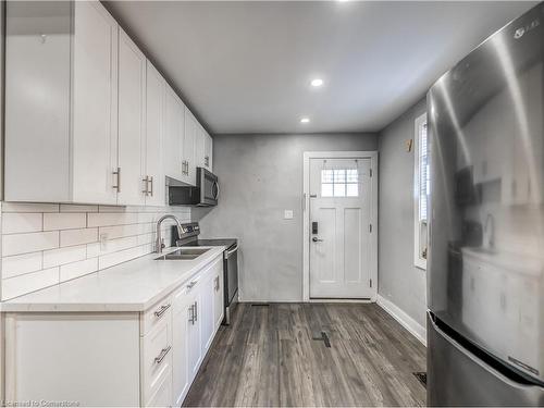 1-48 Shaw Street, Hamilton, ON - Indoor Photo Showing Kitchen With Double Sink